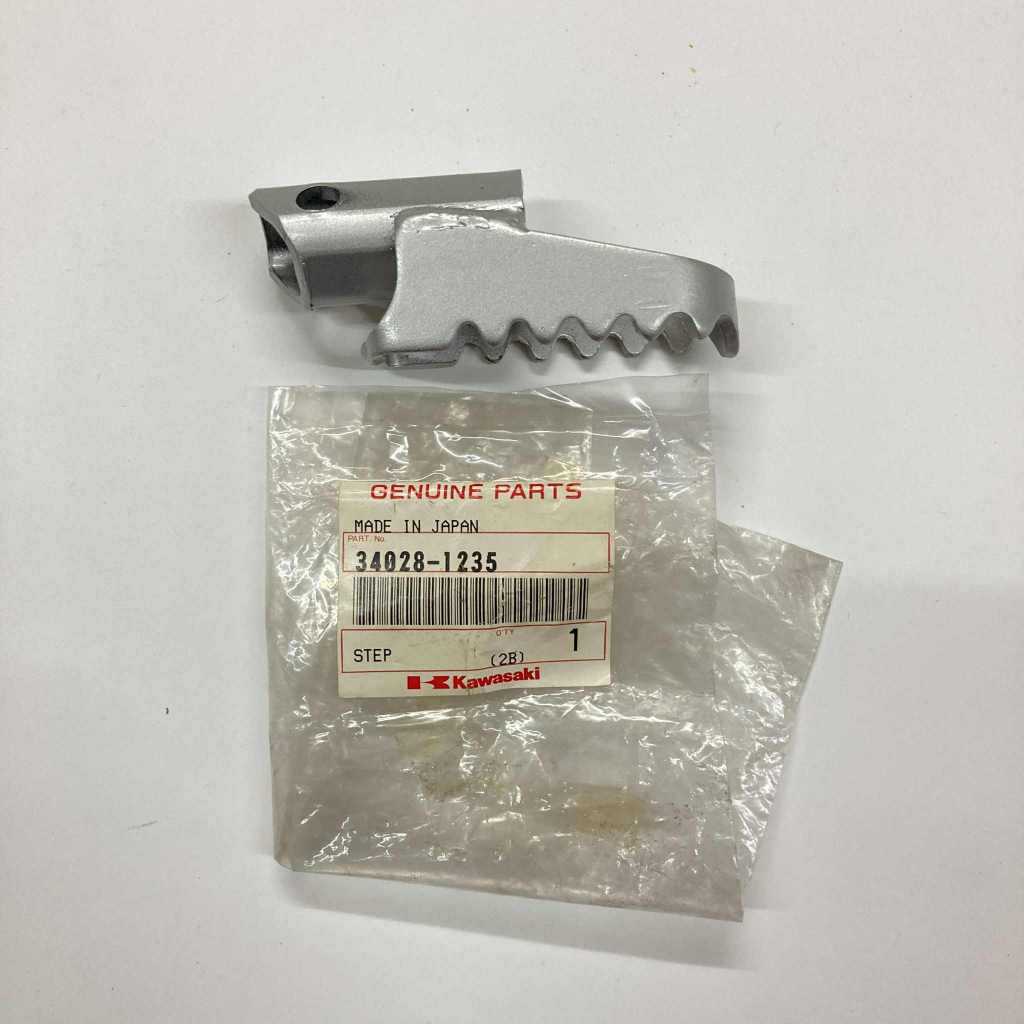 34028-1235 | Footrest Step Left | Genuine Kawasaki parts | KMX125
